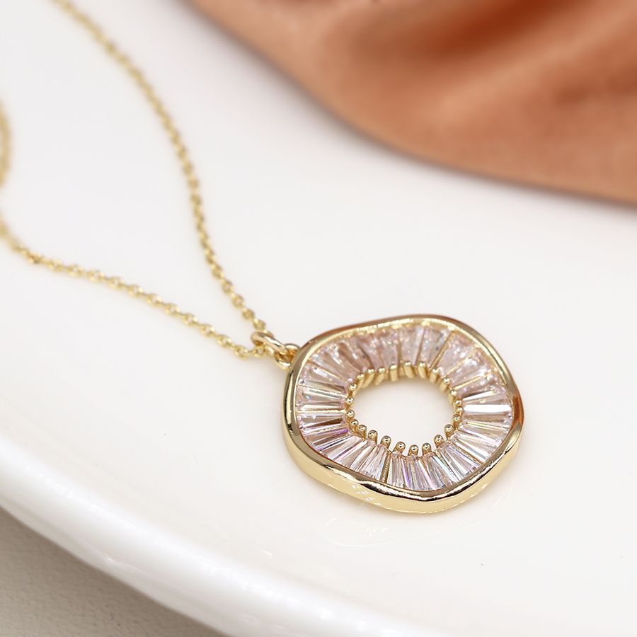 Faux gold organic wave circle necklace with multi oblong crystal inset