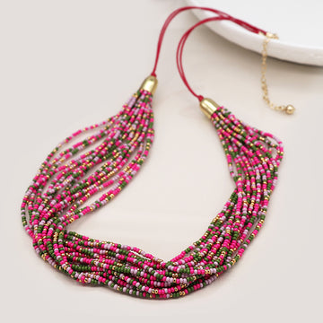 Pink mix multi strand necklace with golden fastening