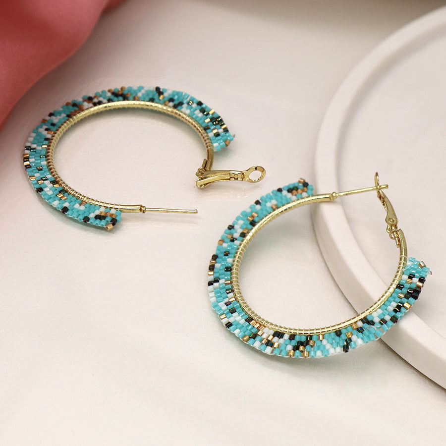 Aqua, white and gold bead hoop earrings