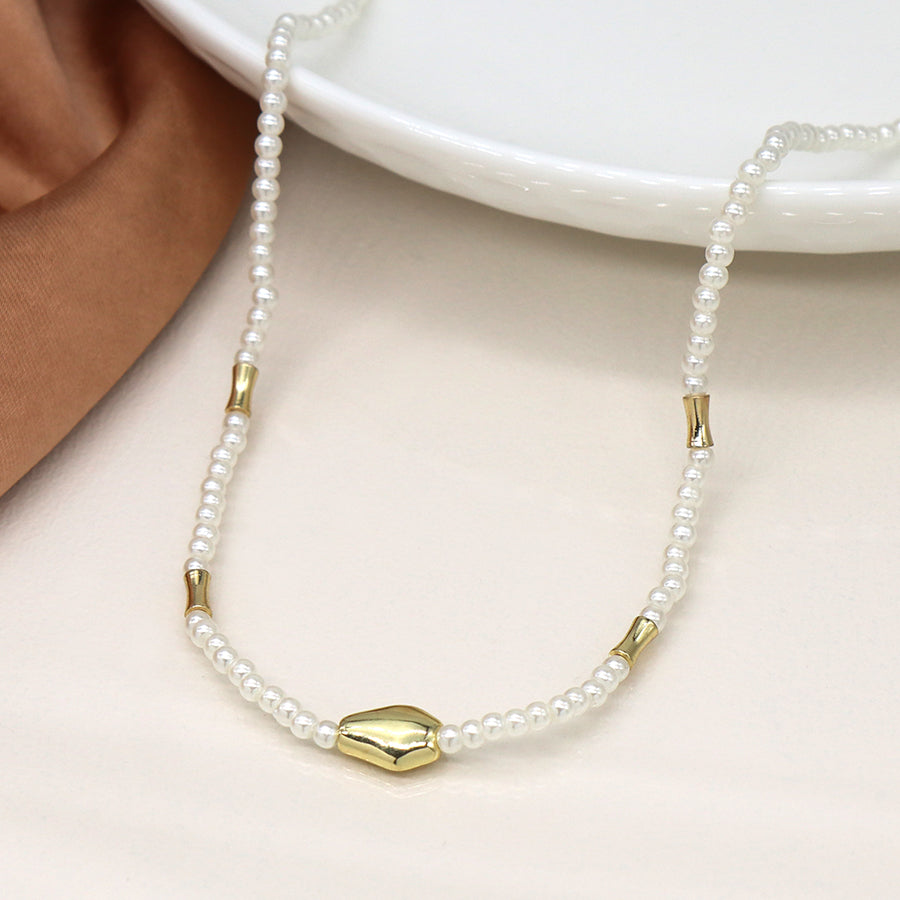 Ivory seed pearl and gold bead necklace