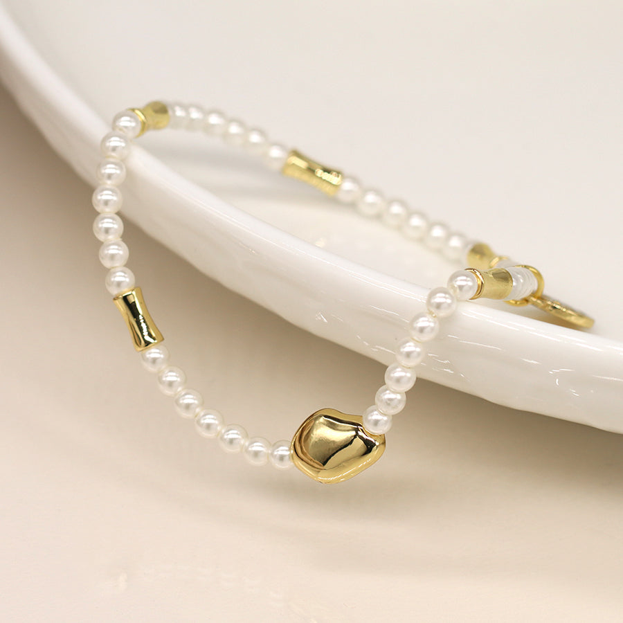 Ivory seed pearl and gold bead bracelet