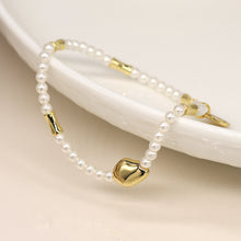 Load image into Gallery viewer, Ivory seed pearl and gold bead bracelet

