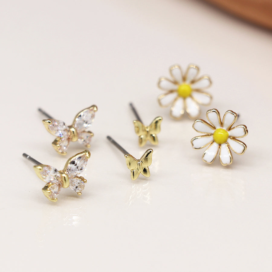 Golden triple flower and butterfly stud set