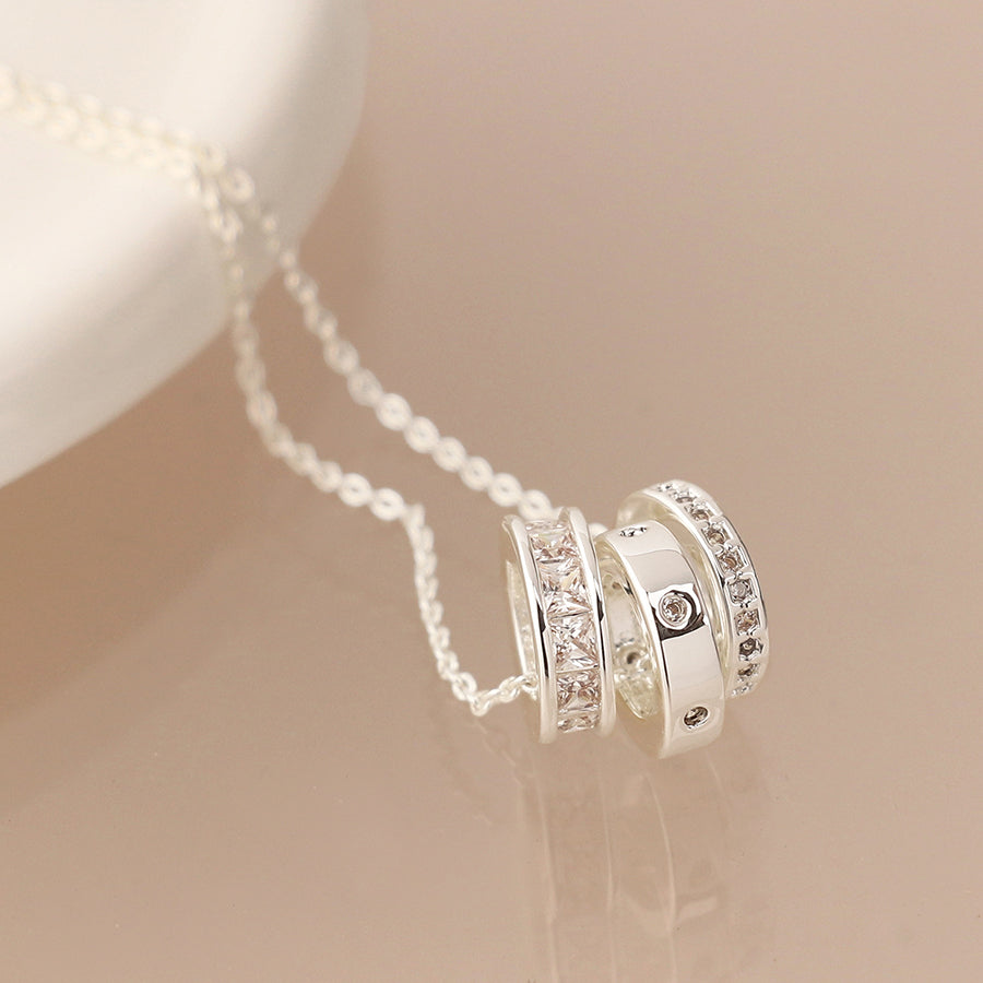 Silver plated triple mini crystal rings necklace