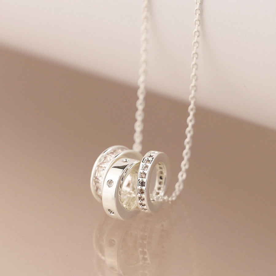 Silver plated triple mini crystal rings necklace