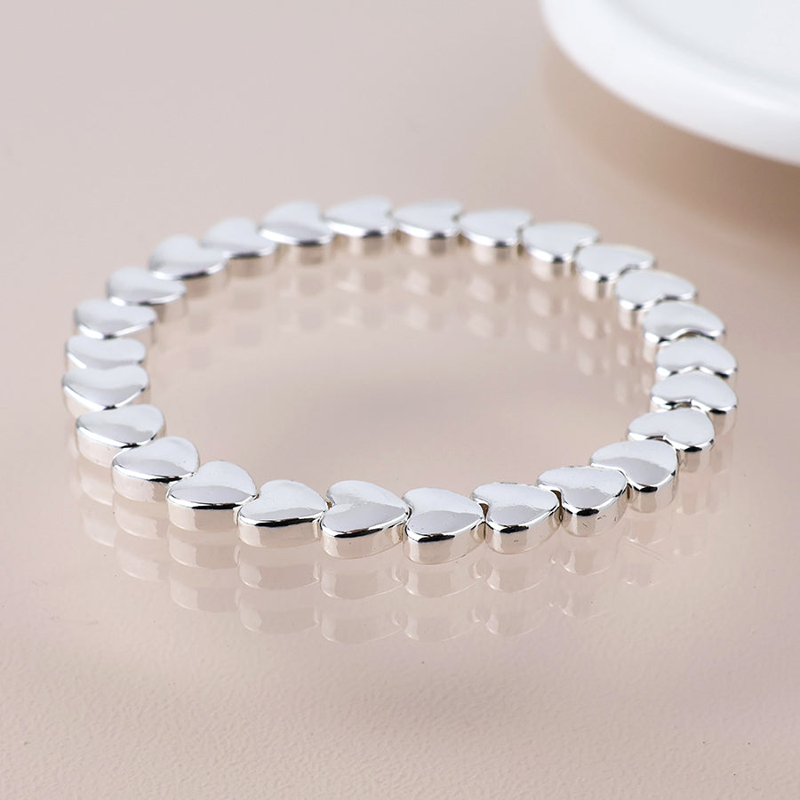Silver plated polished small hearts stretch bracelet