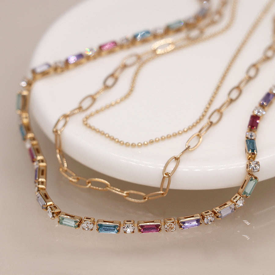Golden multicoloured crystals and chains necklace