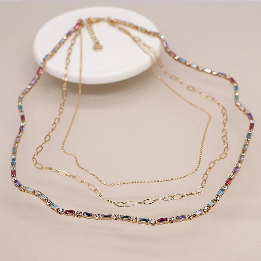 Golden multicoloured crystals and chains necklace