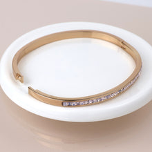 Load image into Gallery viewer, Golden pink crystals hinged bangle
