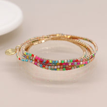Load image into Gallery viewer, Golden multistrand rainbow mix crystal bracelet stack
