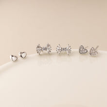 Load image into Gallery viewer, Silver plated bows and hearts triple stud earring set
