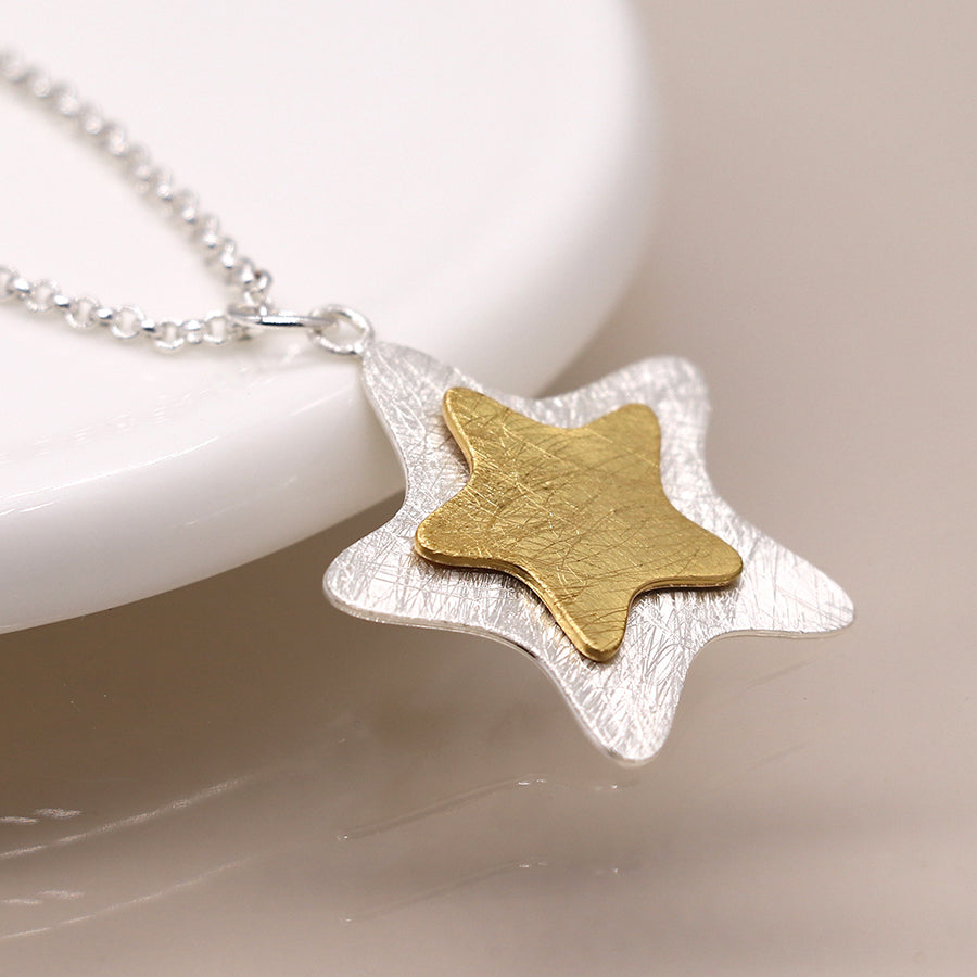 Silver plated and golden layered star necklace
