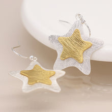 Load image into Gallery viewer, Silver plated and golden layered star earrings
