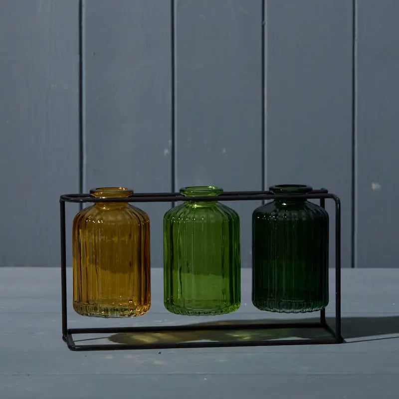 Three Glass Bottles with Stand