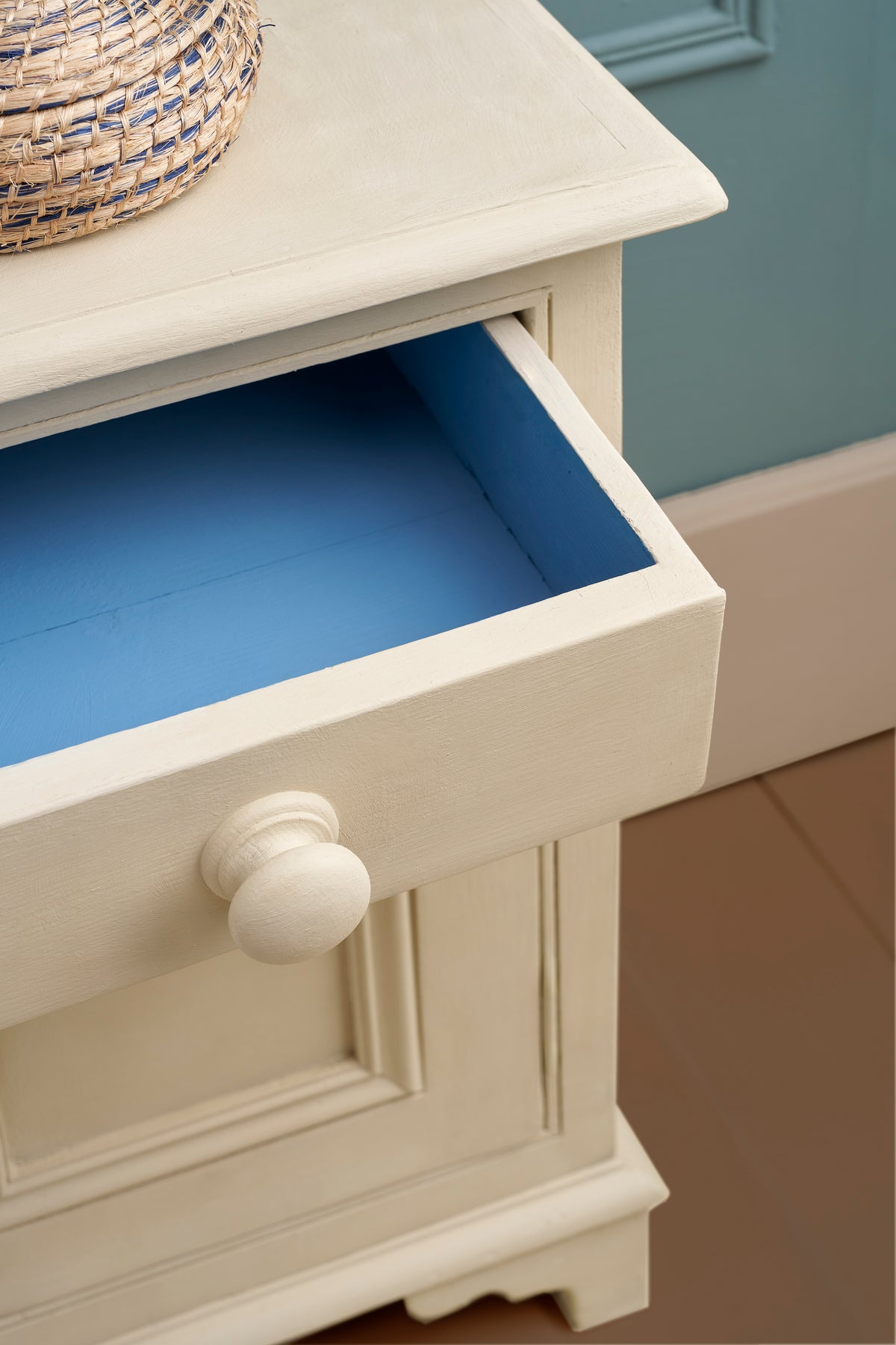 Wooden nightstand painted in Annie 
Sloan Canvas Chalk Paint  with Givency inside the drawer.