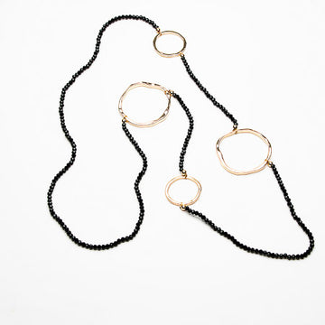 Long Crystal Necklace with metal ring decoration