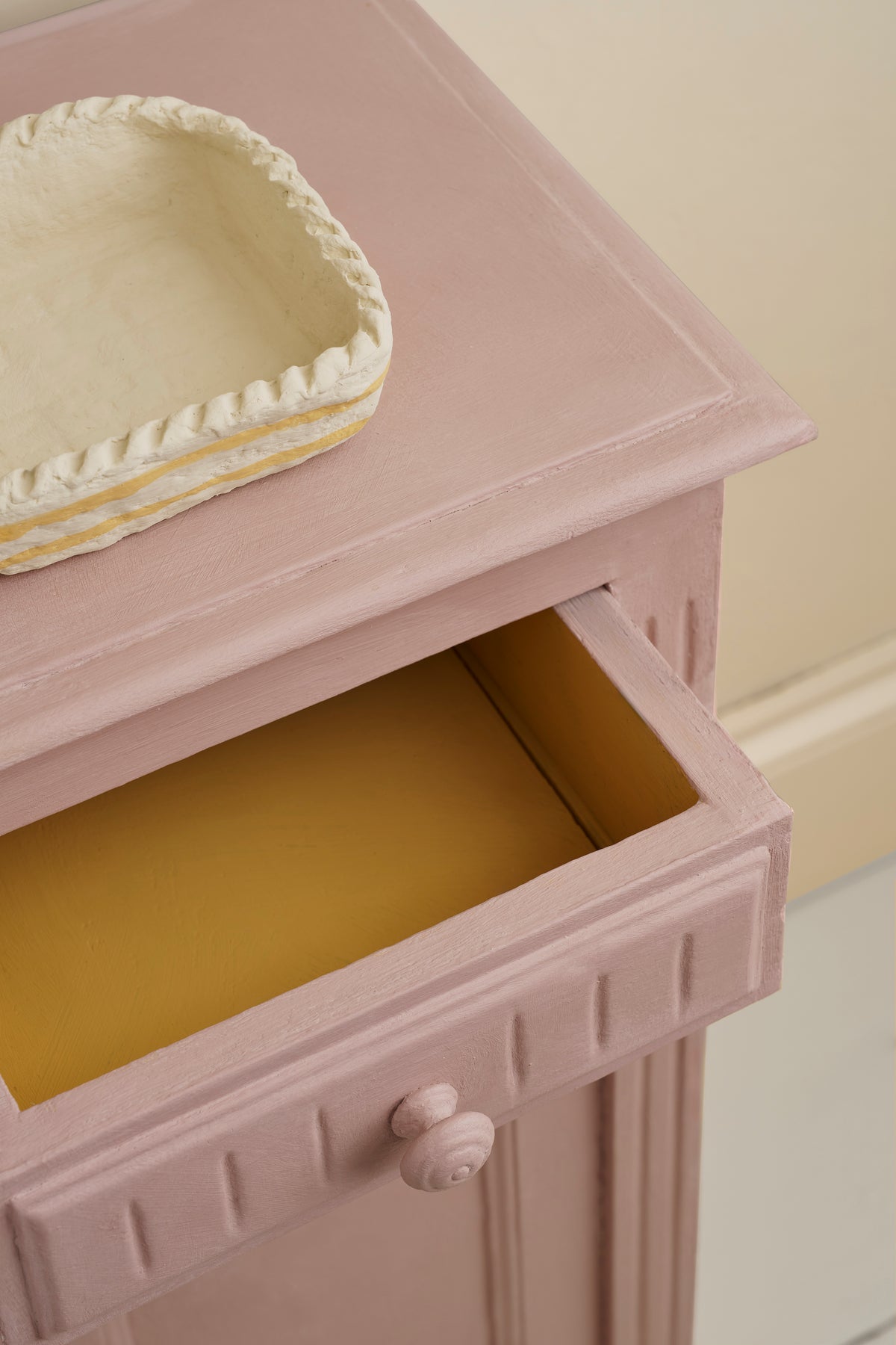 Side table painted in Annie Sloan Chalk Paint Jaipur Pink with drawer inside painted in Arles