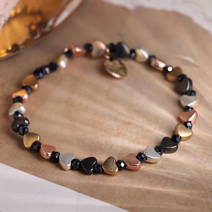Mixed metallic heart bracelet with black beads